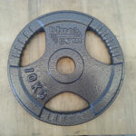 Set di Dischi Olimpici in Ferro + Bilanciere Team Line -100KG - immagine 2